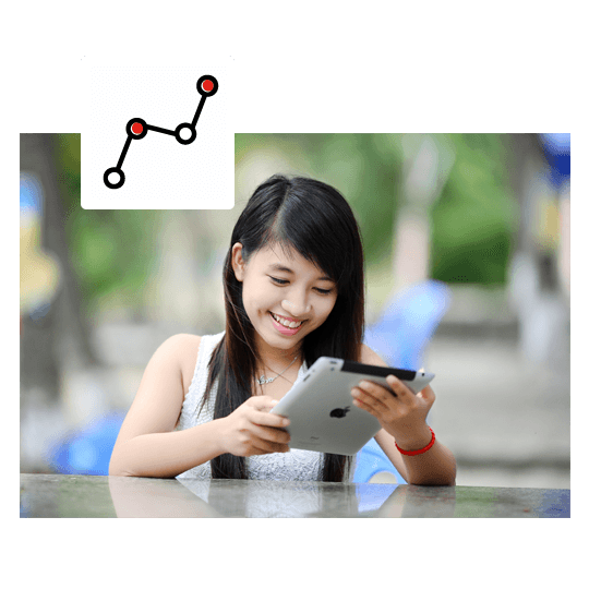 woman-reading-analytics-report-on-ipad_v2 woman-reading-analytics-report-on-ipad_v2
